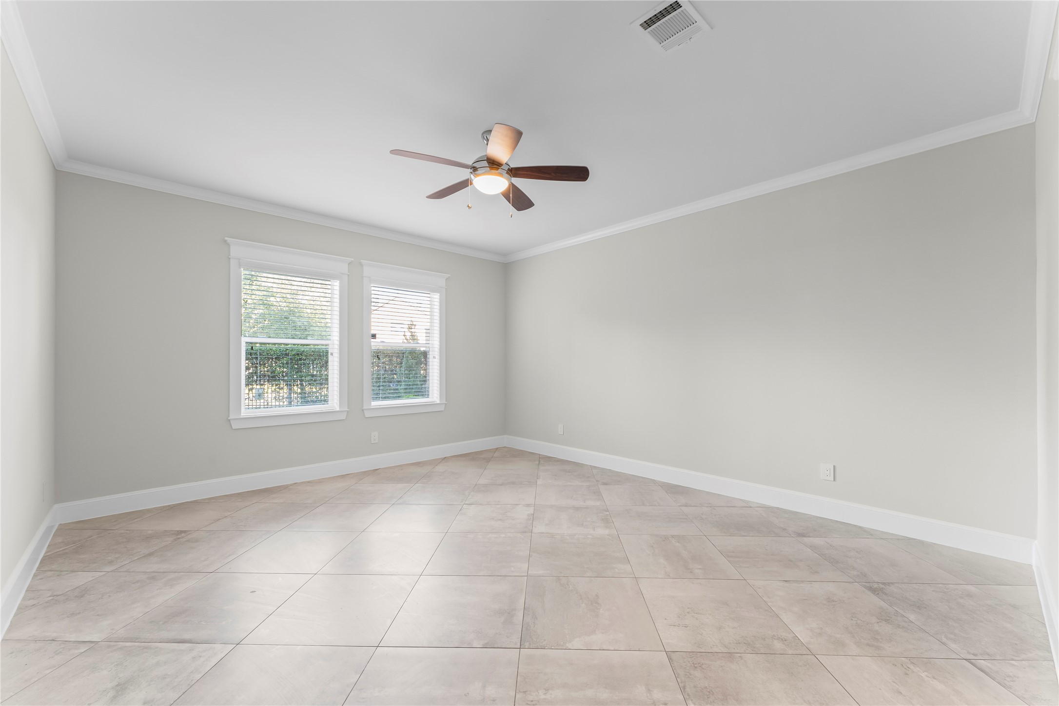 2806 Princeton Street Houston, TX 77009 - Photo 3 of 20 a view of an empty room with a window
