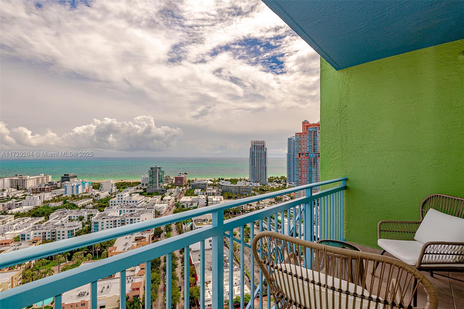 90 Alton Road, Unit PH3205 Miami Beach, FL 33139 - Photo 1 of 28 a view of city from a balcony