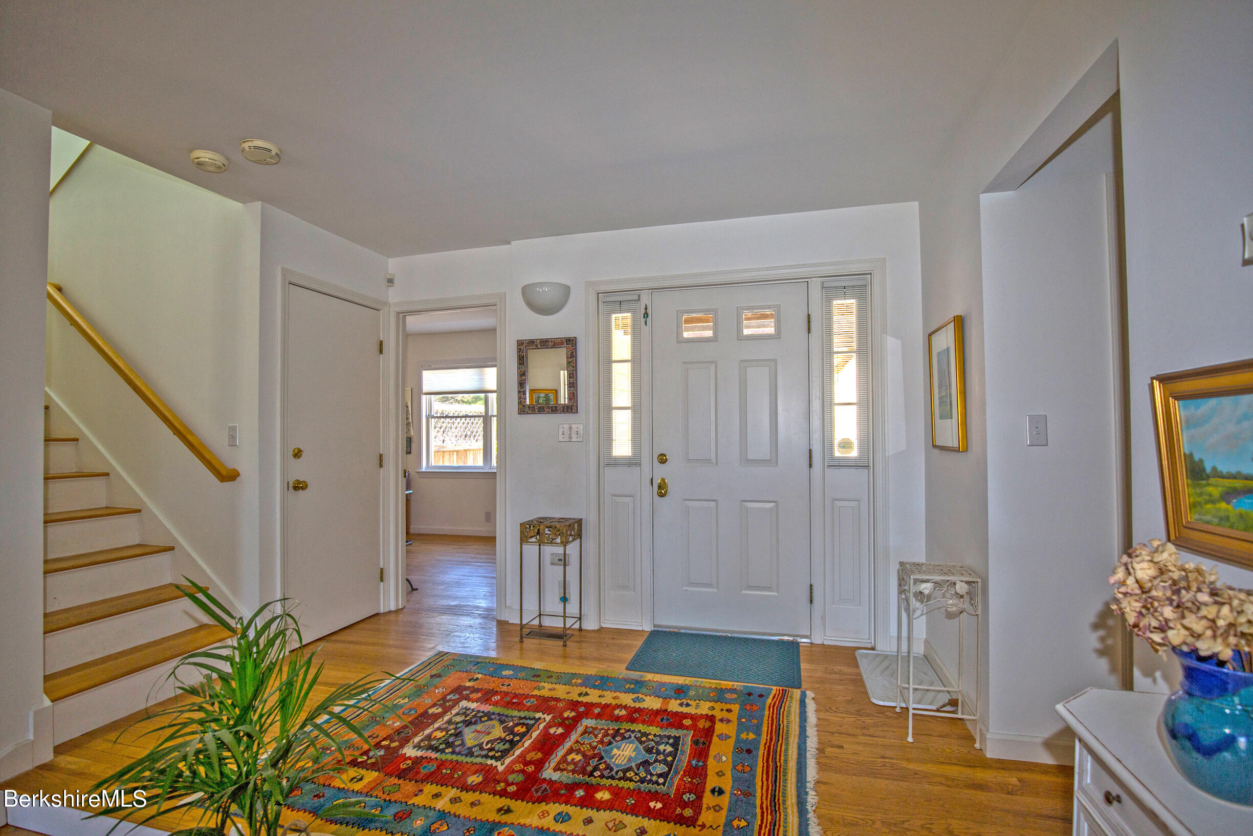 1136 Barker Road, Unit 48 Pittsfield, MA 01201 - Photo 18 of 53 a living room with furniture and a rug