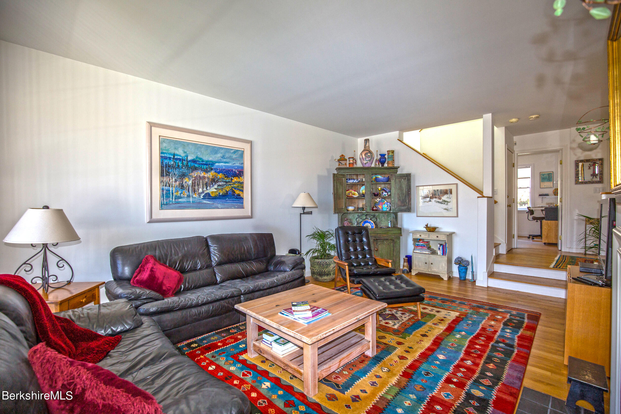 1136 Barker Road, Unit 48 Pittsfield, MA 01201 - Photo 23 of 53 a living room with furniture and a rug