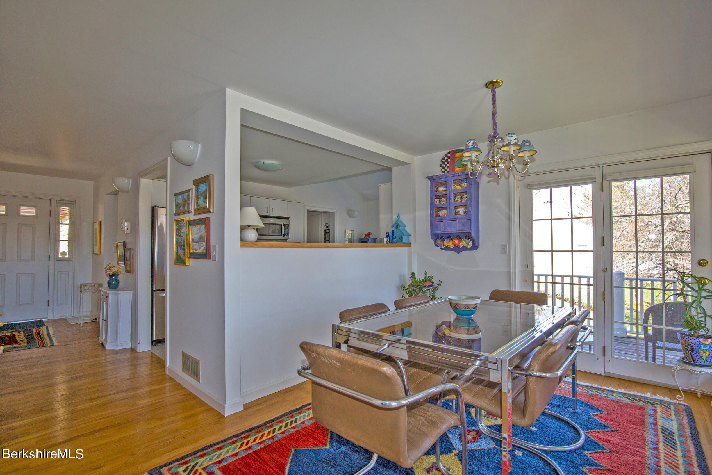 1136 Barker Road, Unit 48 Pittsfield, MA 01201 - Photo 24 of 53 a work room with furniture and wooden floor