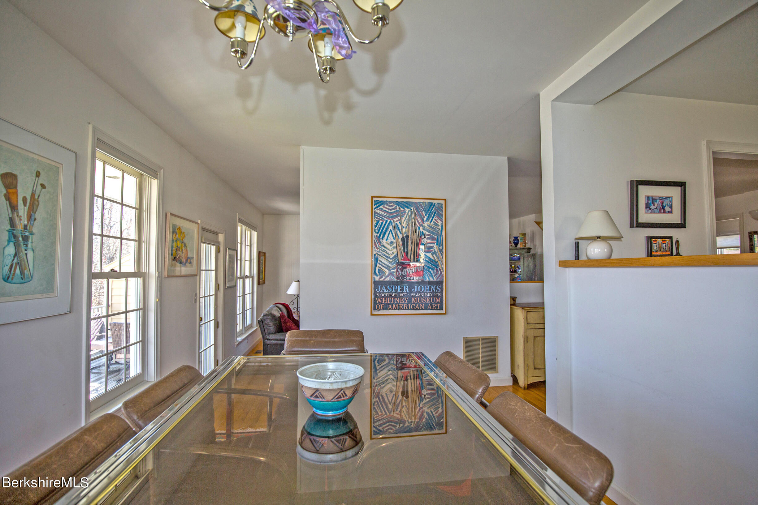 1136 Barker Road, Unit 48 Pittsfield, MA 01201 - Photo 25 of 53 a living room with furniture and a table