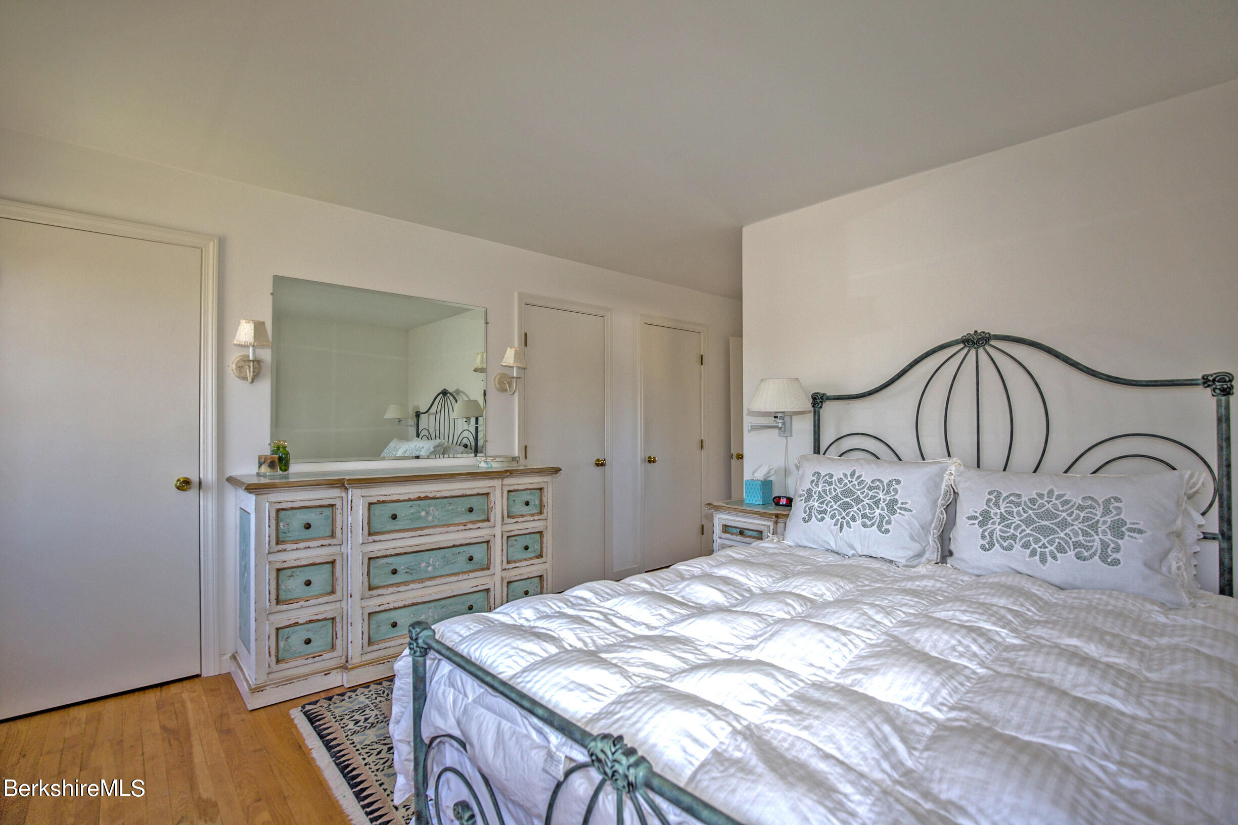 1136 Barker Road, Unit 48 Pittsfield, MA 01201 - Photo 32 of 53 a bedroom with a bed and a dresser