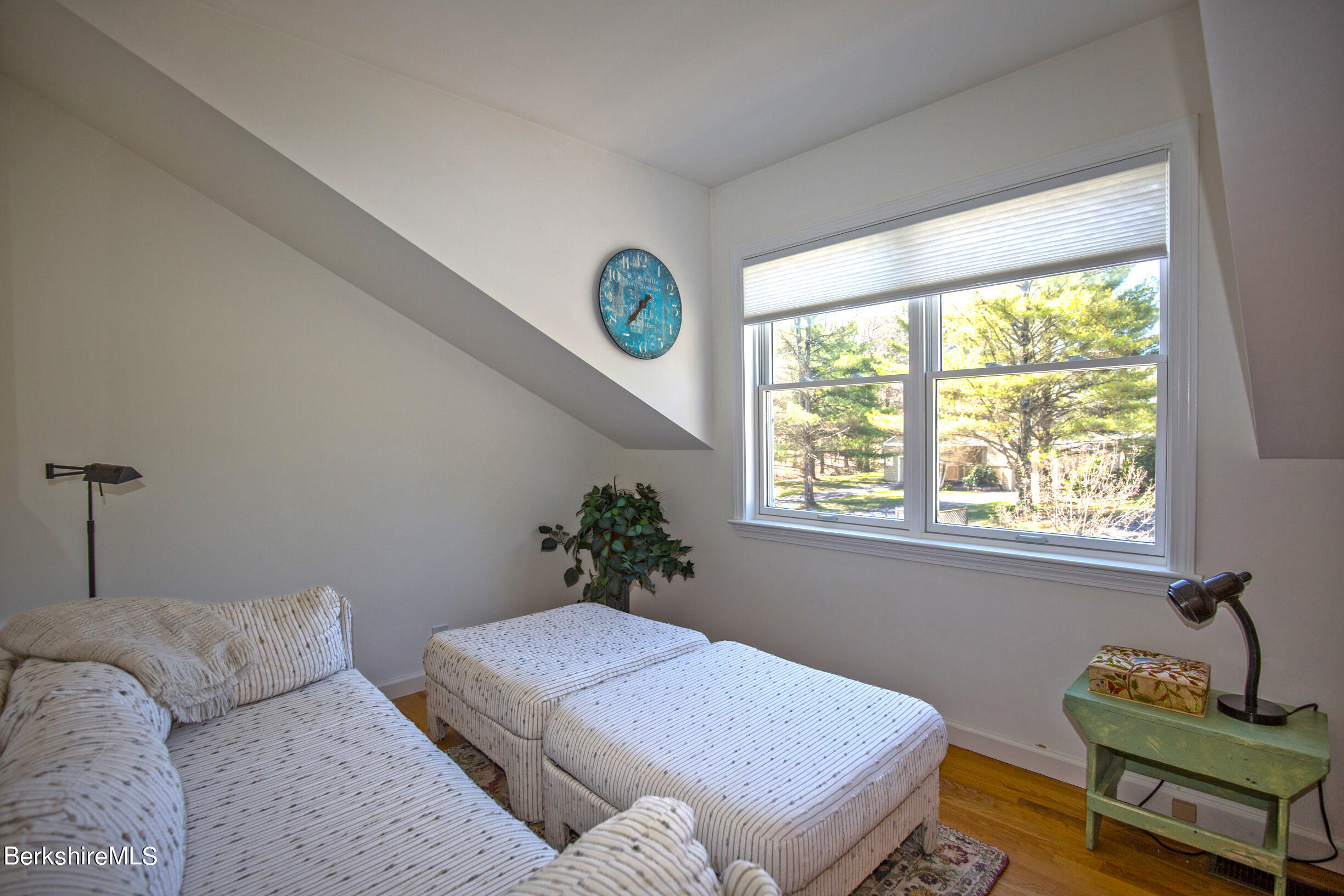1136 Barker Road, Unit 48 Pittsfield, MA 01201 - Photo 36 of 53 a bedroom with a bed and window