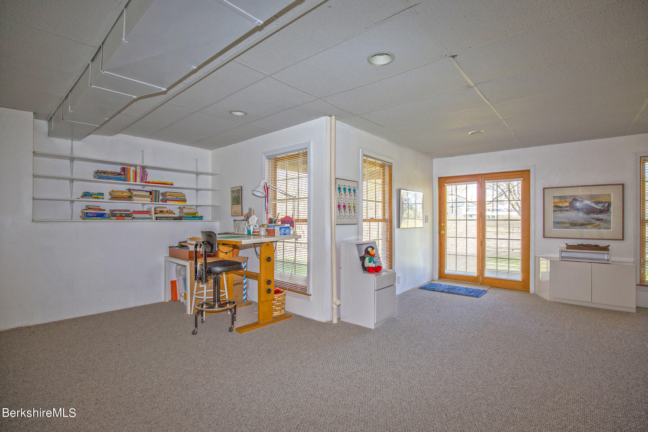 1136 Barker Road, Unit 48 Pittsfield, MA 01201 - Photo 37 of 53 a view of livingroom with furniture and windows