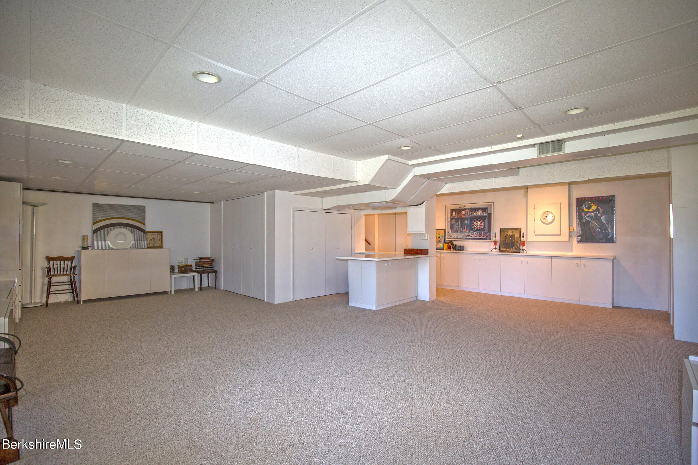 1136 Barker Road, Unit 48 Pittsfield, MA 01201 - Photo 38 of 53 a view of a livingroom with furniture and a window