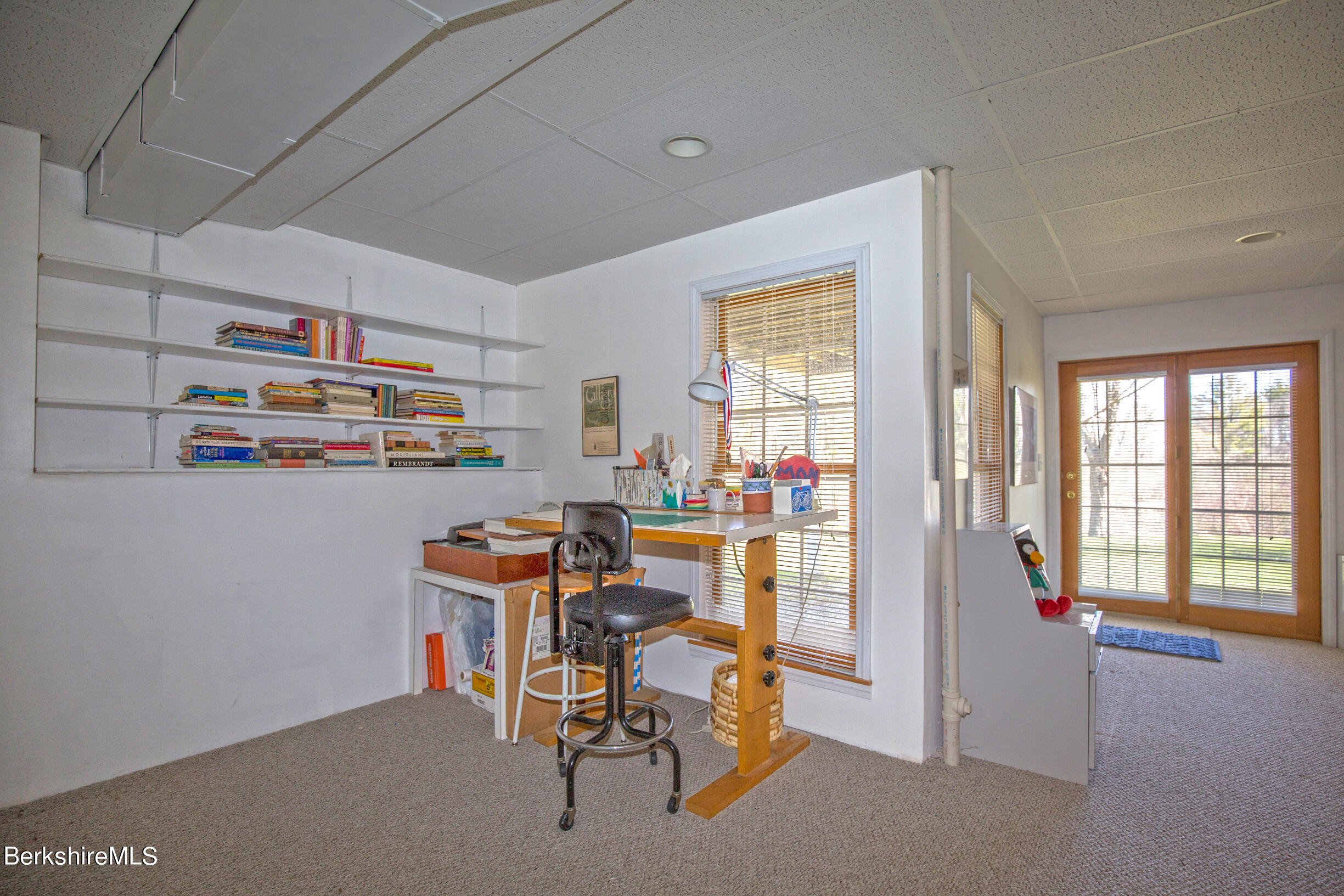 1136 Barker Road, Unit 48 Pittsfield, MA 01201 - Photo 39 of 53 a view of a workspace with furniture and a window