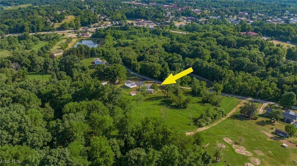 165 Old Rix Mills Road New Concord, OH 43762 - Photo 31 of 34 Aerial view with a forest view and a water view