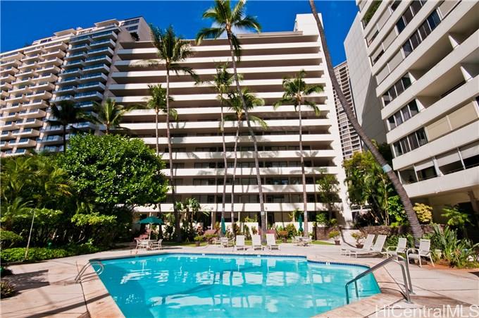 a view of building with yard