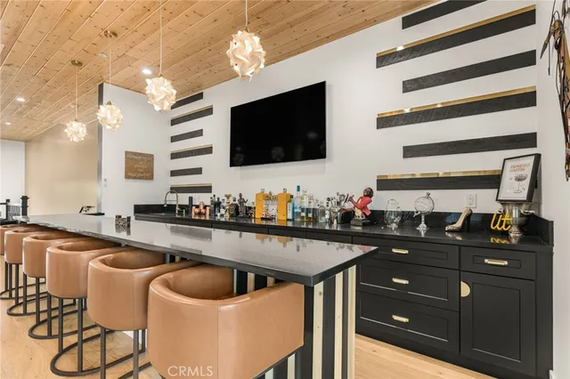 a spacious bedroom with a bed and a large window