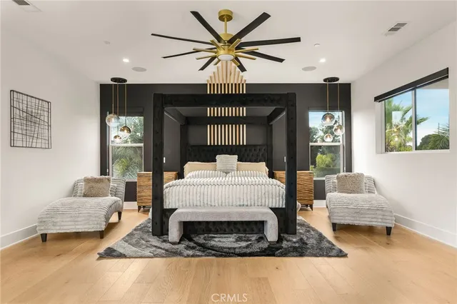 a bathroom with a sink vanity and mirror
