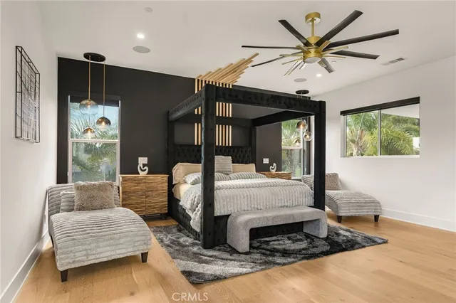 a bathroom with a glass shower door and a sink