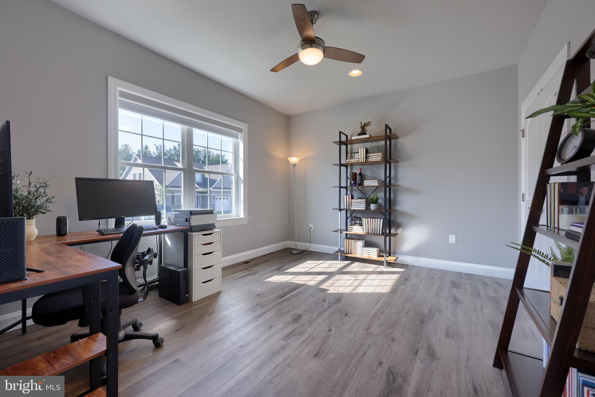 208 Buckton Drive Lititz, PA 17543 - Photo 8 of 25 a view of a workspace with furniture and a window