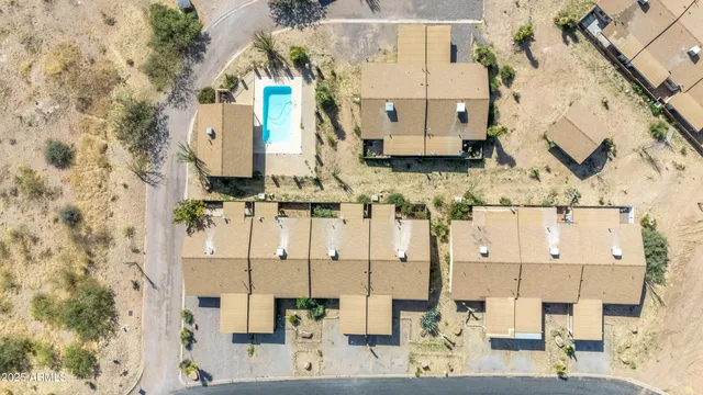 a kitchen with granite countertop a sink stainless steel appliances and cabinets