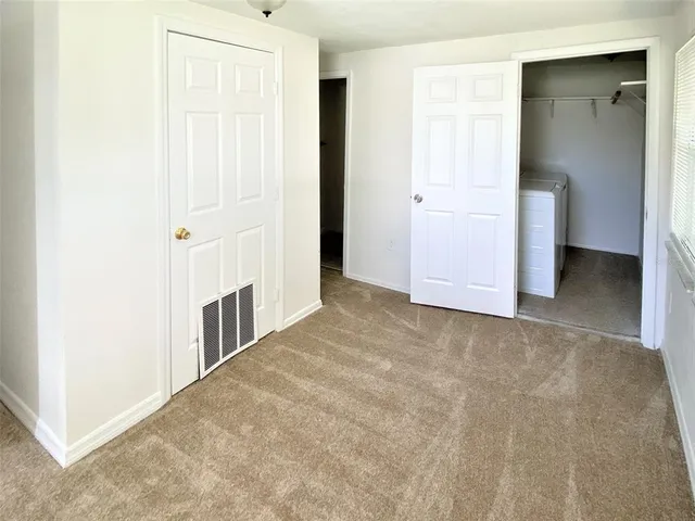 an empty room with closet