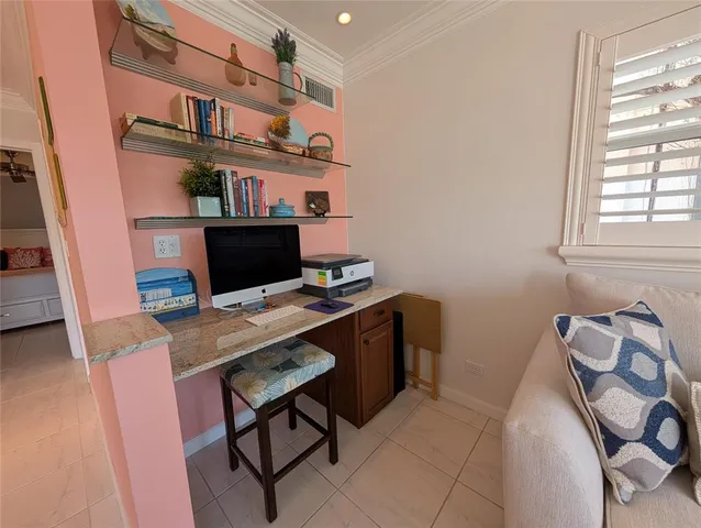 a view of a workspace with furniture