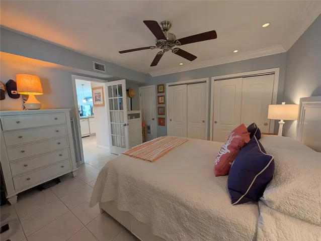 a bed room with a bed and a dresser