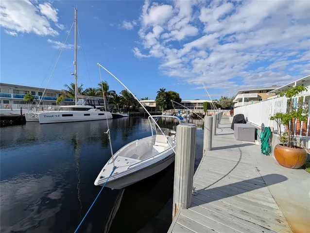a view of a balcony with chairs
