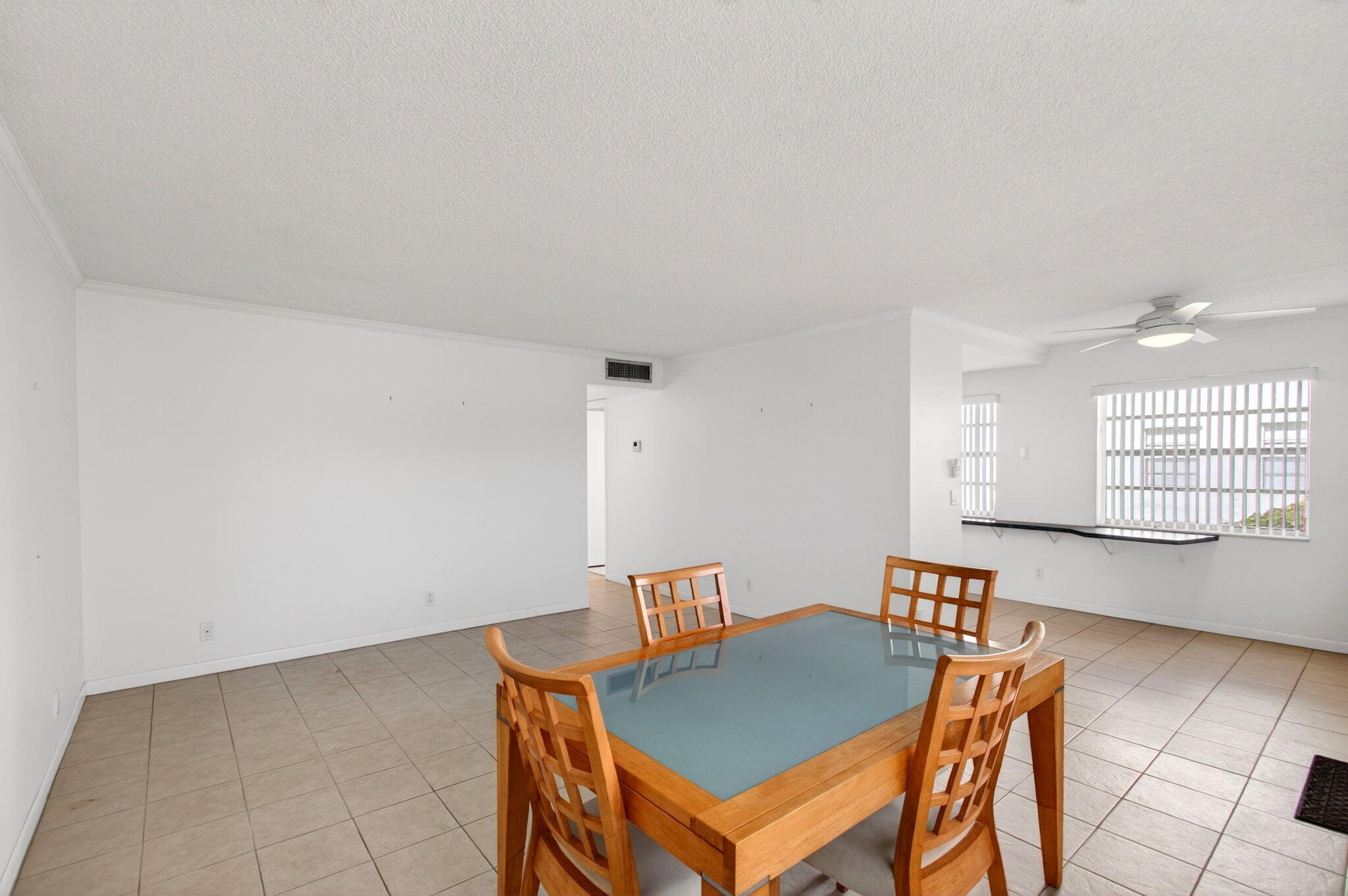 167 Normandy Lane, Unit D Delray Beach, FL 33484 - Photo 11 of 46 Open Concept Dining and Living Area
