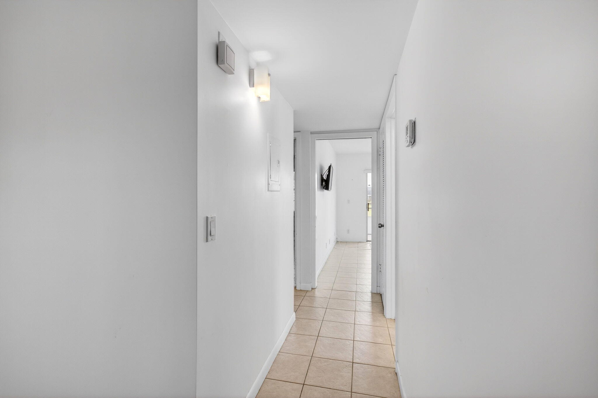 167 Normandy Lane, Unit D Delray Beach, FL 33484 - Photo 15 of 46 Hallway to Baths and Bedrooms