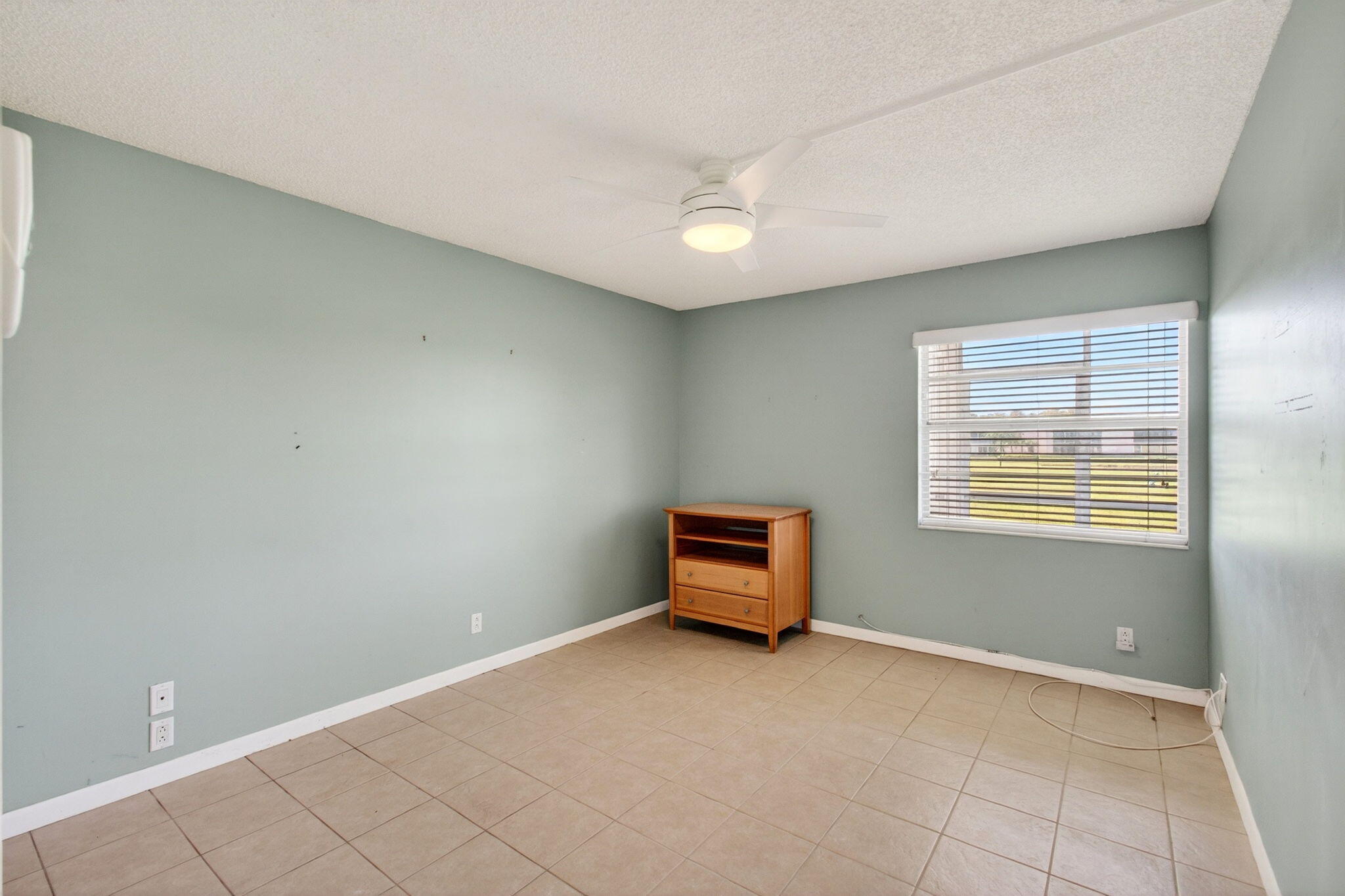 167 Normandy Lane, Unit D Delray Beach, FL 33484 - Photo 27 of 46 Spacious Tiled Bedroom