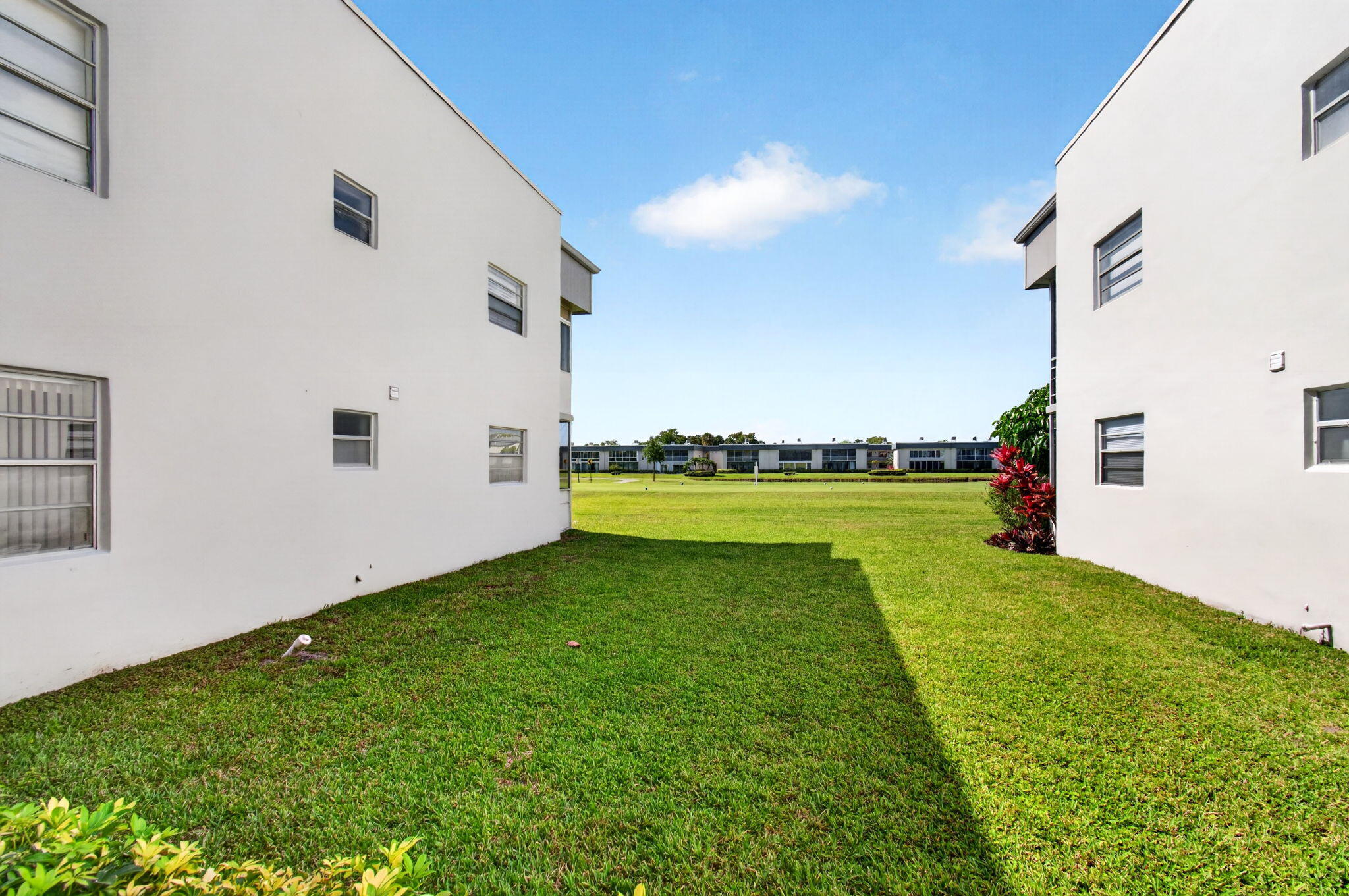 167 Normandy Lane, Unit D Delray Beach, FL 33484 - Photo 46 of 46 Greenspace View from Side of Condo
