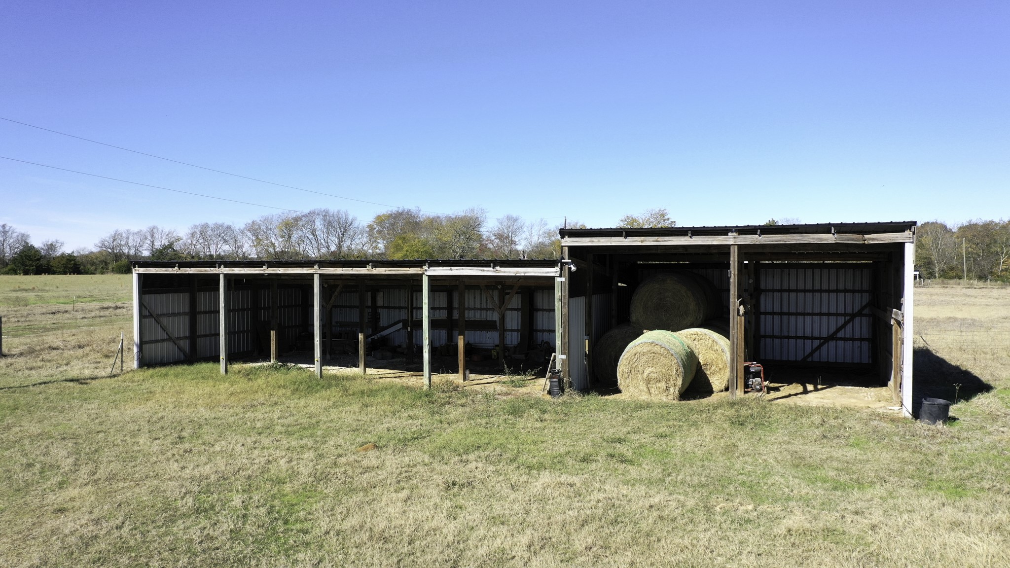 596 County Road 3057 Crockett, TX 75835 - Photo 15 of 38 a view of a house with a backyard