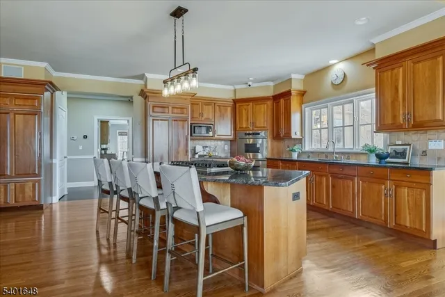 a view of kitchen center island and living room