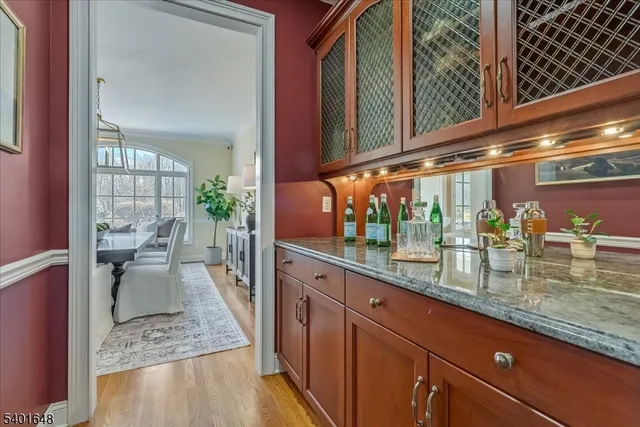 a view of a livingroom with furniture and a fireplace