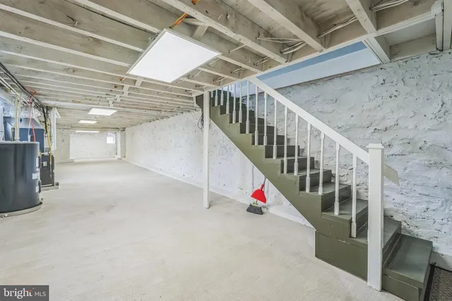 a view of an empty room with stairs