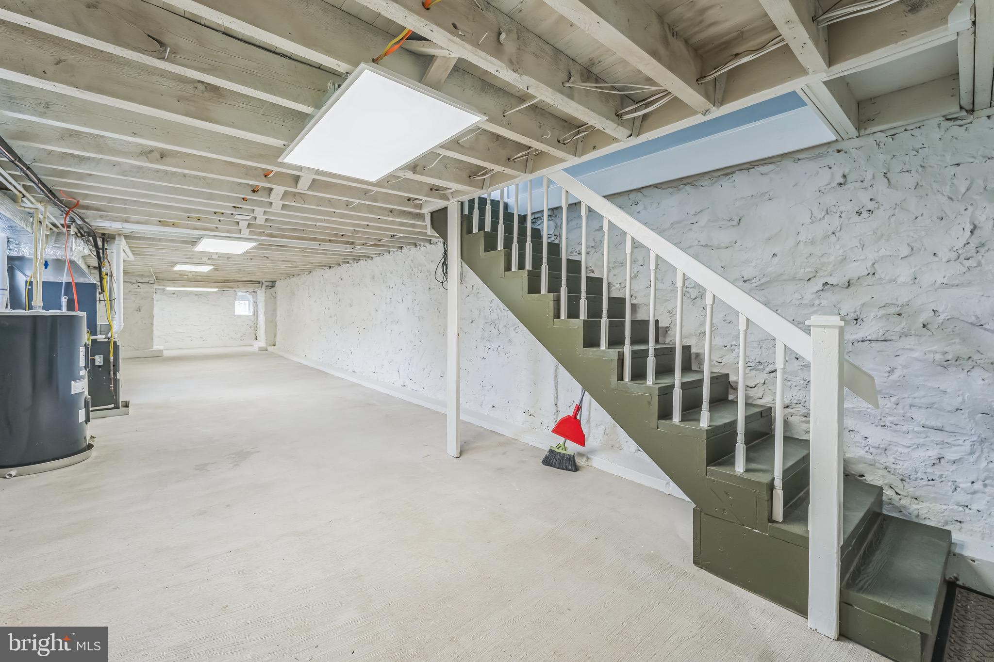 1036 Poplar Grove Street Baltimore, MD 21216 - Photo 23 of 24 a view of an empty room with stairs