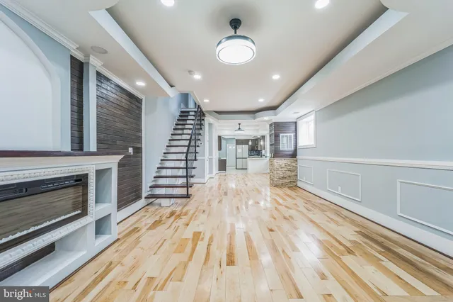 a view of a livingroom with wooden floor