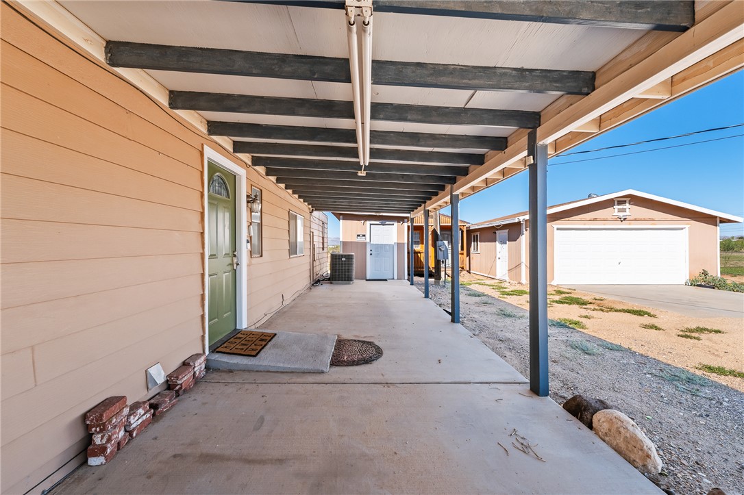 3475 Adobe Road Golden Valley, AZ 86413 - Photo 46 of 71 View of patio with an outdoor structure