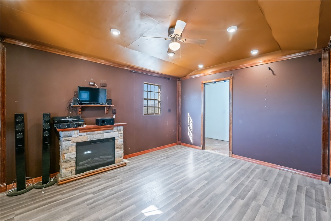 3475 Adobe Road Golden Valley, AZ 86413 - Photo 48 of 71 Bar area with vaulted ceiling, wood finished floors, a ceiling fan, and recessed lighting