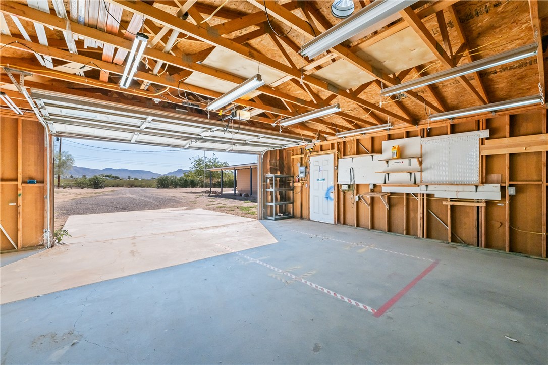3475 Adobe Road Golden Valley, AZ 86413 - Photo 54 of 71 Garage with a mountain view