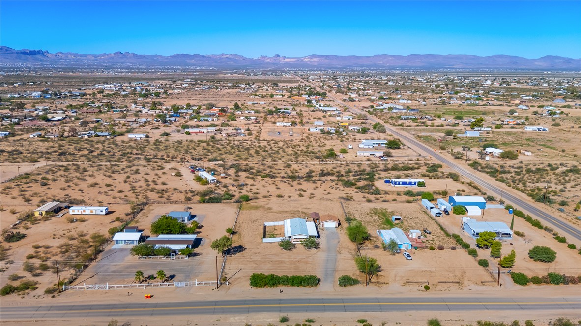 3475 Adobe Road Golden Valley, AZ 86413 - Photo 56 of 71 View of rural area featuring a mountain backdrop and a desert landscape