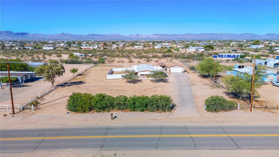3475 Adobe Road Golden Valley, AZ 86413 - Photo 59 of 71 Aerial view of sparsely populated area featuring a mountainous background
