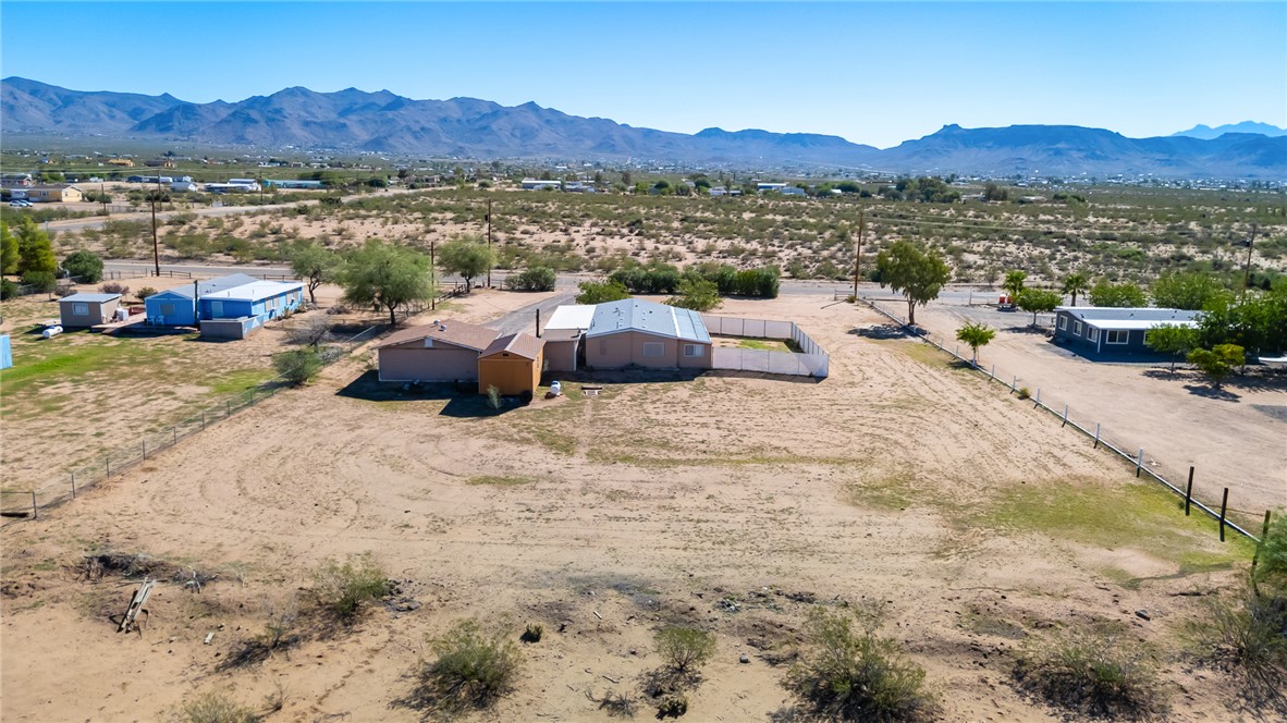 3475 Adobe Road Golden Valley, AZ 86413 - Photo 66 of 71 View of rural area featuring a mountain backdrop