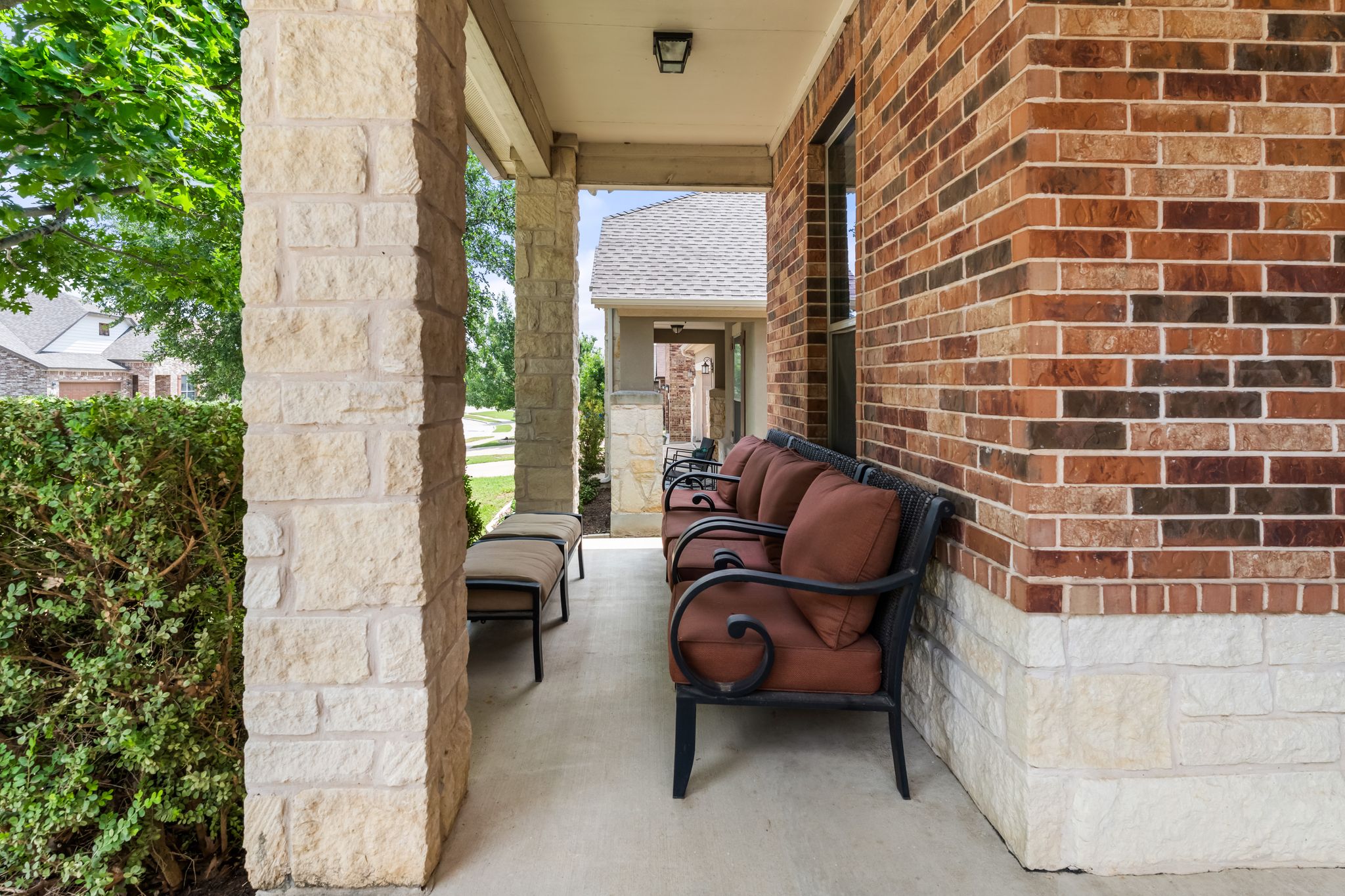 1133 Yellow Iris Road Leander, TX 78641 - Photo 24 of 37 Covered porch featuring a brick and stone facade