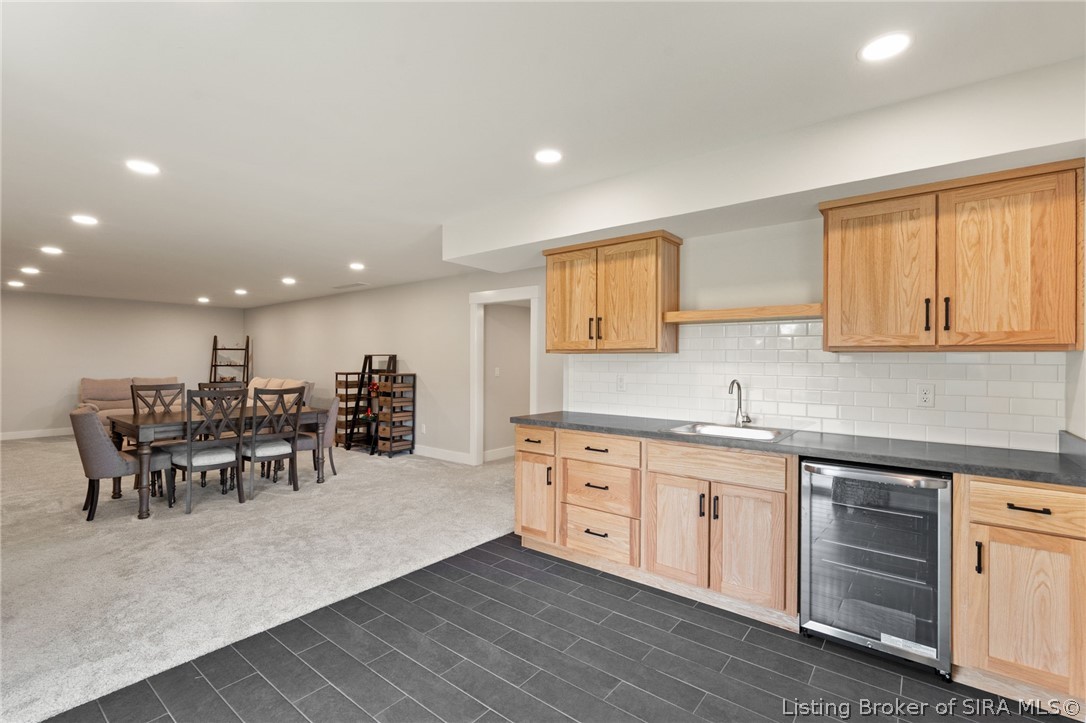 6019 Rising Fawn Court Georgetown, IN 47122 - Photo 9 of 50 Amazing wet bar, perfect for entertaining or game nights.