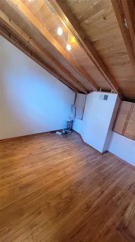 a view of empty room with an ocean view