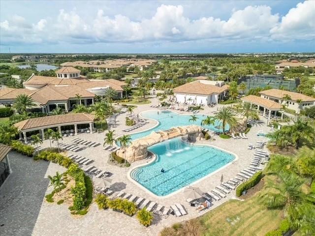 5528 Arnie Loop Lakewood Ranch, FL 34211 - Photo 57 of 59 an aerial view of residential houses with outdoor space