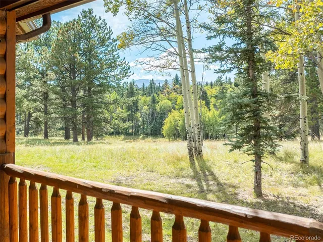 a view of a yard from a balcony