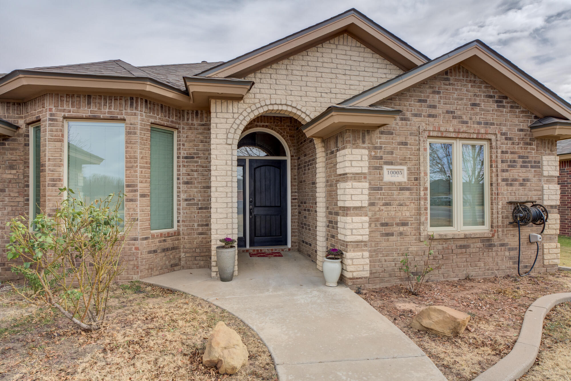 10005 Iola Avenue Lubbock, TX 79424 - Photo 2 of 50 DSC07886_87_88_89_90