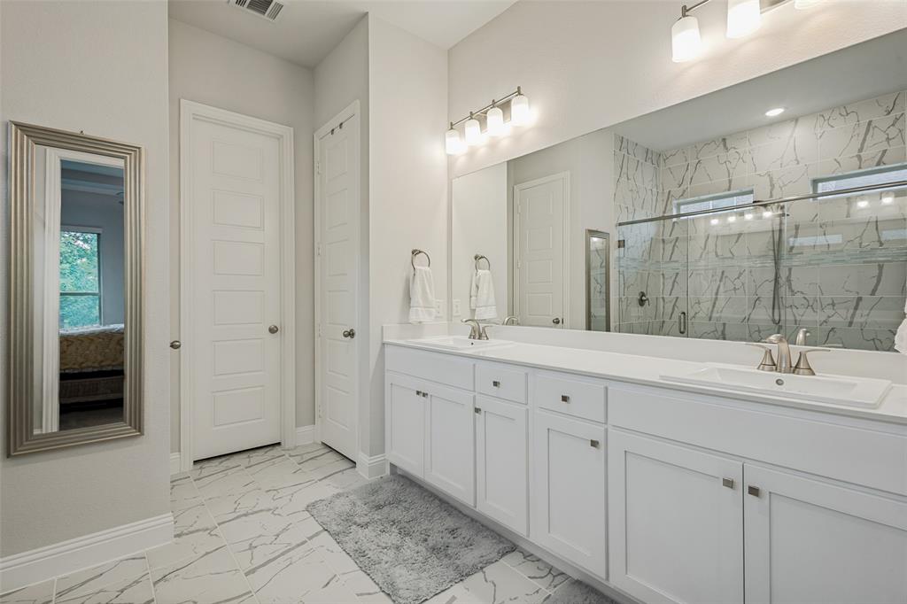 1508 Bear Path Way Gunter, TX 75058 - Photo 11 of 25 a spacious bathroom with double sink and mirror