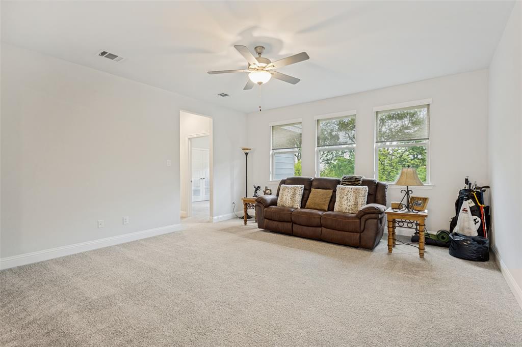 1508 Bear Path Way Gunter, TX 75058 - Photo 15 of 25 a living room with furniture and a chandelier