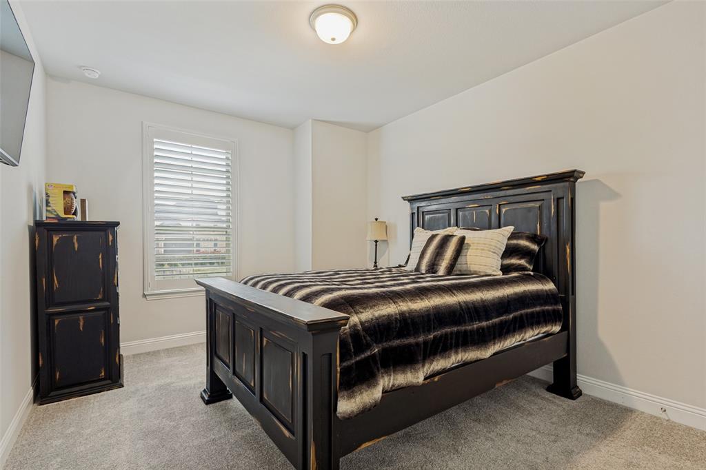 1508 Bear Path Way Gunter, TX 75058 - Photo 18 of 25 a bedroom with a bed and a window