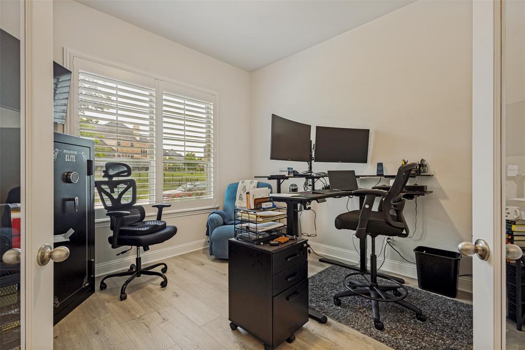 1508 Bear Path Way Gunter, TX 75058 - Photo 3 of 25 a view of a workspace with furniture and a window