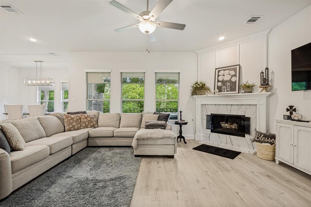 1508 Bear Path Way Gunter, TX 75058 - Photo 6 of 25 a living room with furniture and a fireplace