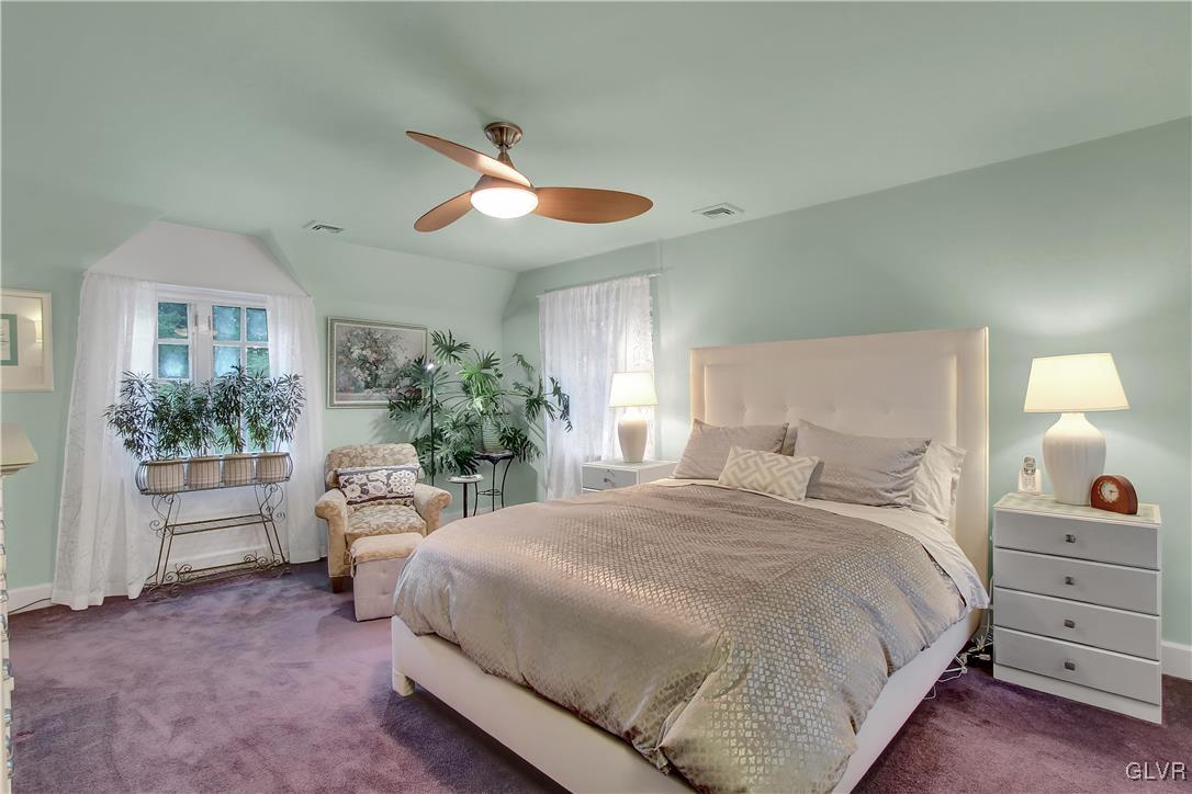 414 South Tulpehocken Road Reading, PA 19601 - Photo 27 of 41 a bedroom with a bed and a chandelier